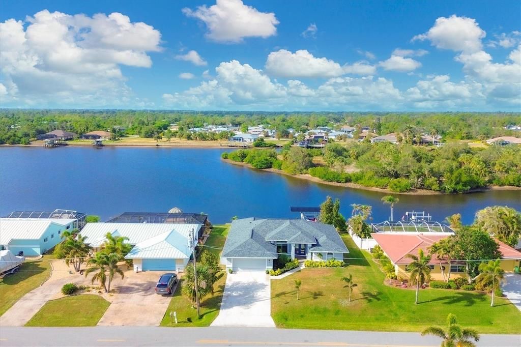 Saltwater front with 10,000 pound boat lift and only 5-7 minutes to the Peace River. Fish from your dock.