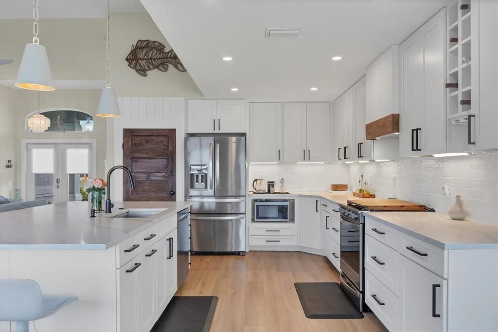 Open floor plan with wainscotting.