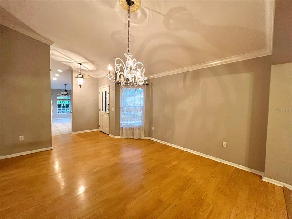 View of front door/foyer/dining room