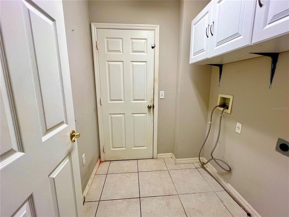 laundry room w/ door leading into garage