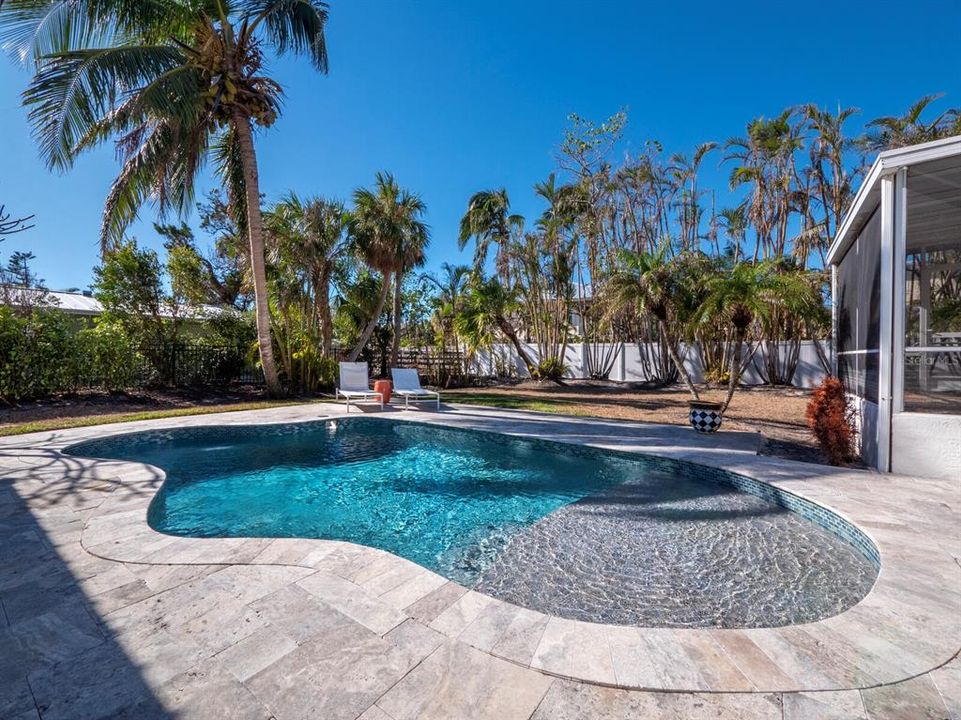 611 Hibiscus features a large fenced in back yard and a gorgeous pool