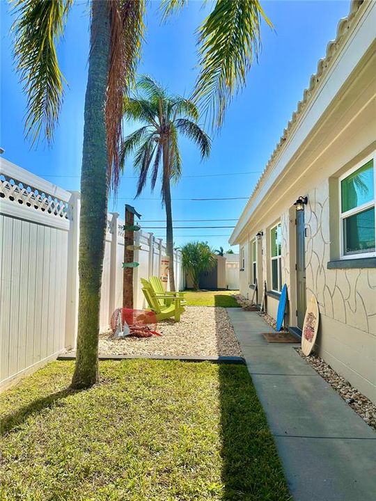 Front sidewalk to entrance doors to both units