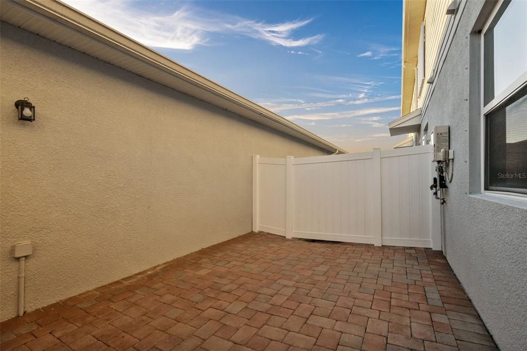 Courtyard area with pavers - 2 car garage connects