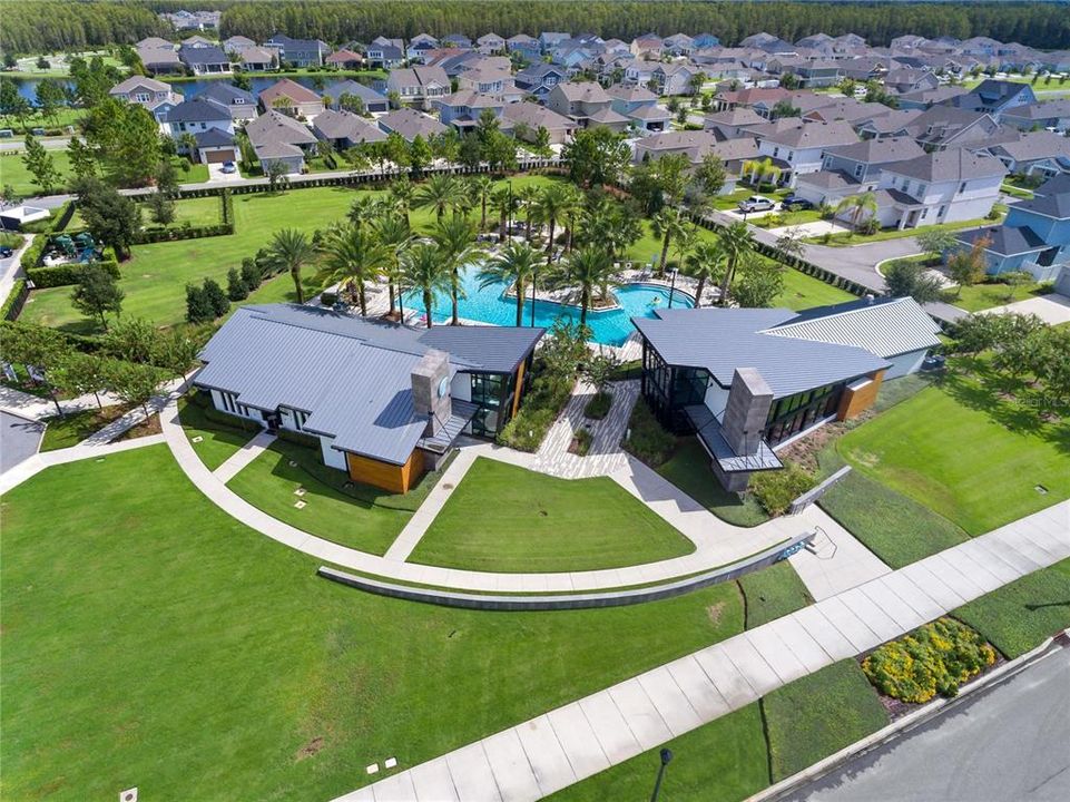 Aerial View of Clubhouse (on left), Gym (on right), and pool behind