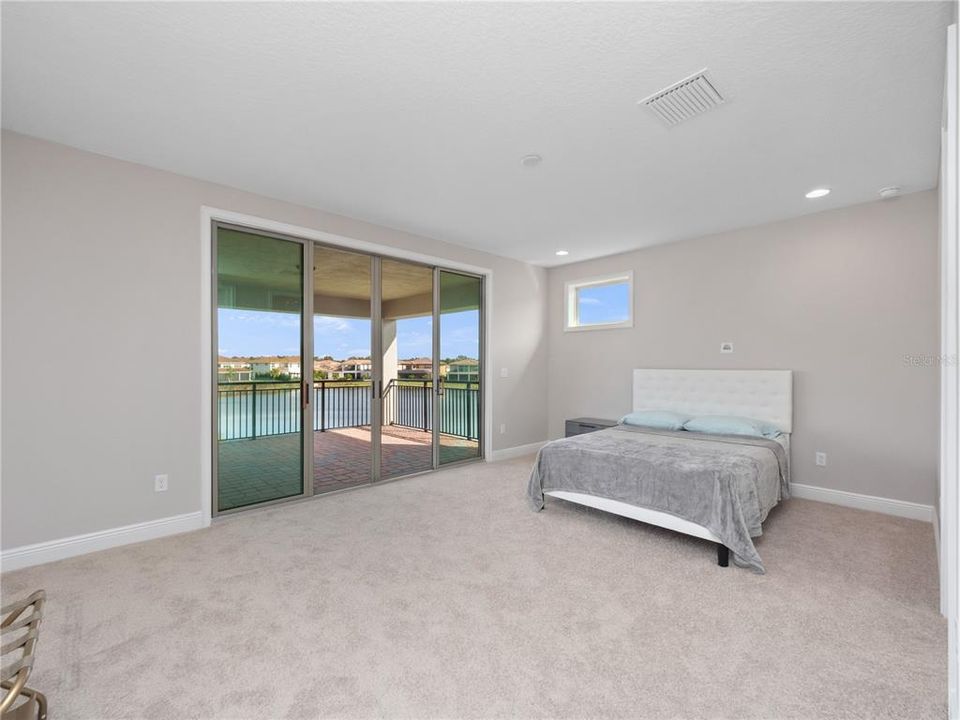 bedroom 5 with balcony and en-suite bathroom