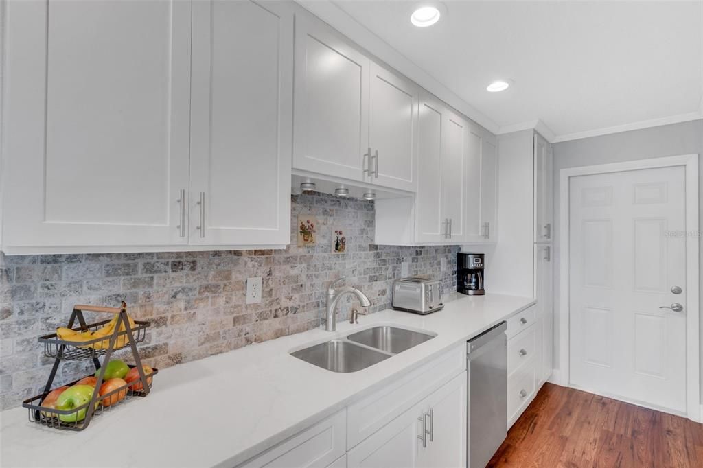 Beautifully remodeled kitchen with closet pantry & garage access~