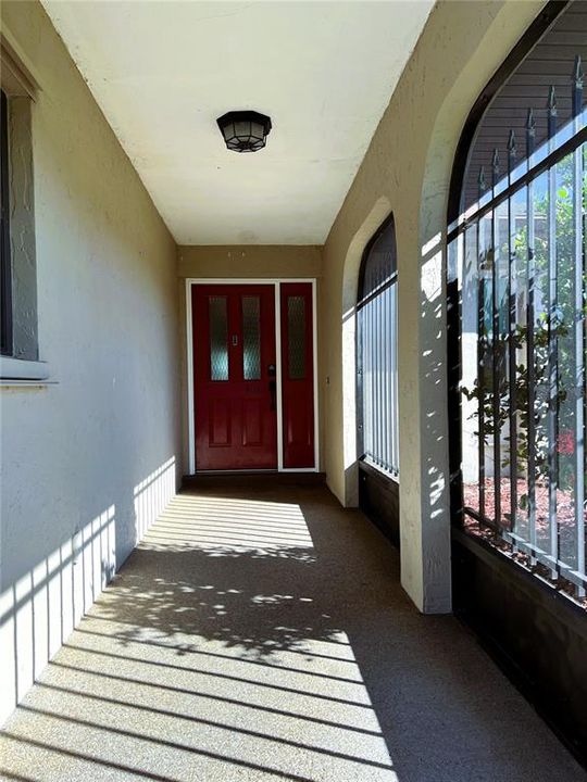 Welcomed Home! This Screened Front Porch is Perfect for that entryway bench you have always wanted :-)