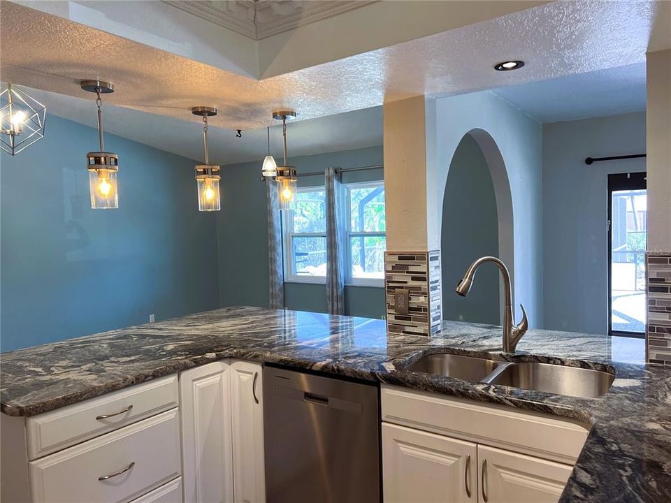 The Kitchen Overlooks the Pool & Fresh Water Canal!