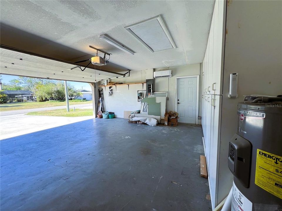 Notice that this garage has a Side Door, A Window and A/C Mini Split System! Ready for an extra room or mother in law suite!