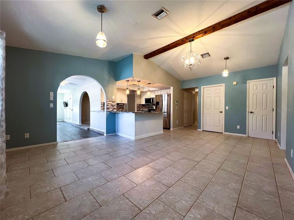 This Open Floor Plan Area of the home will allow you to enjoy gatherings while serving & cooking for friends & family!