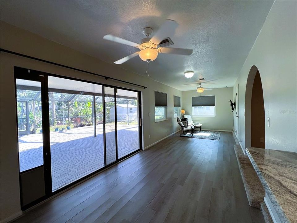 So much natural light! This space has so much potential for various uses; office, gym, fun room, play room, reading area..you name it!