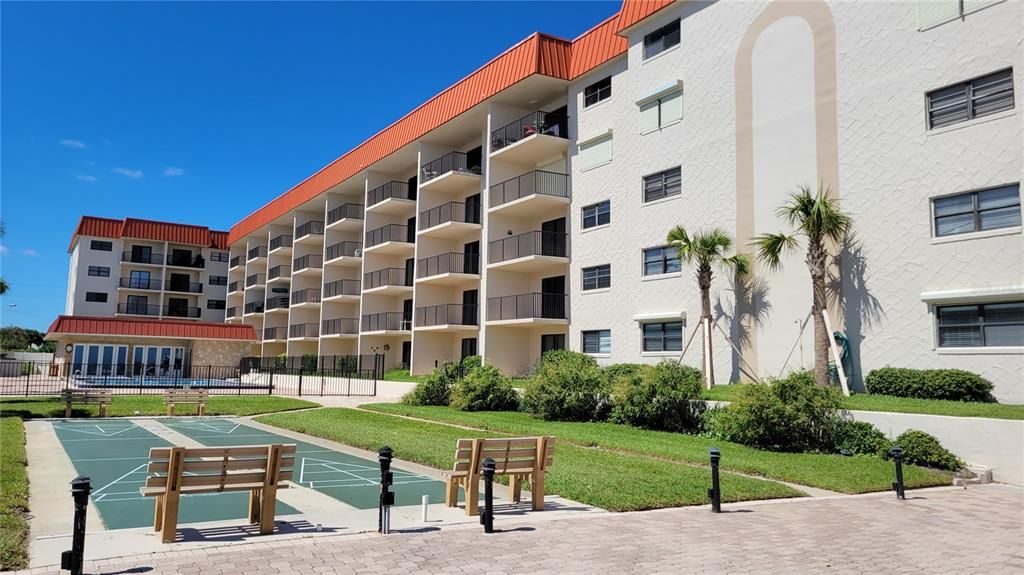 Pool side - two shuffleboard courts - cabana