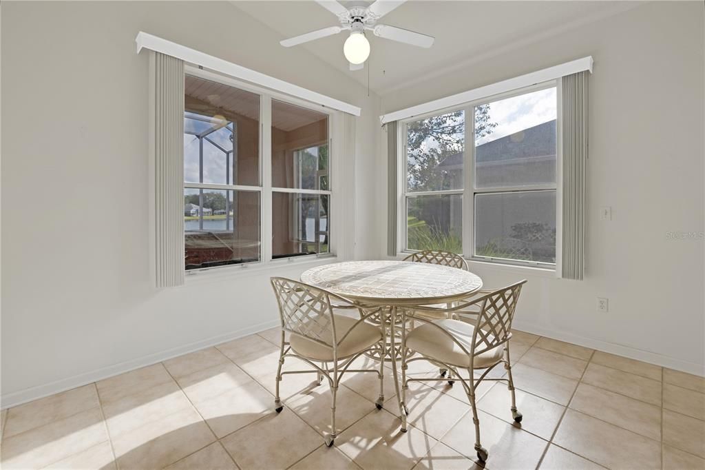 Informal eating area  Lots of natural light w/lake views.