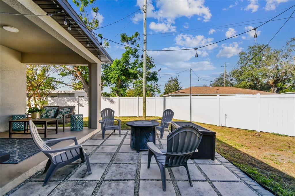 Covered Back Patio with Paver Stone Patio Area