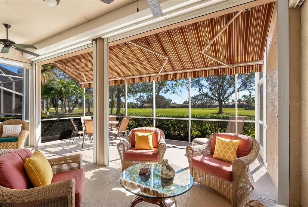 Covered Lanai w/ retractable awning Course Views