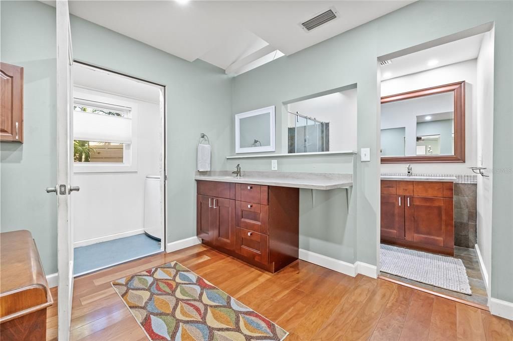 Extra sink next to the laundry room for added convenience.