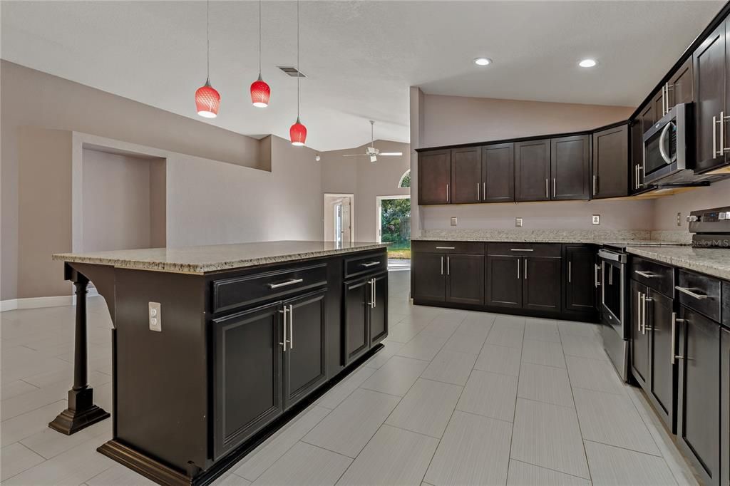 Kitchen with Beautiful Wood Cabinets and Granite countertops