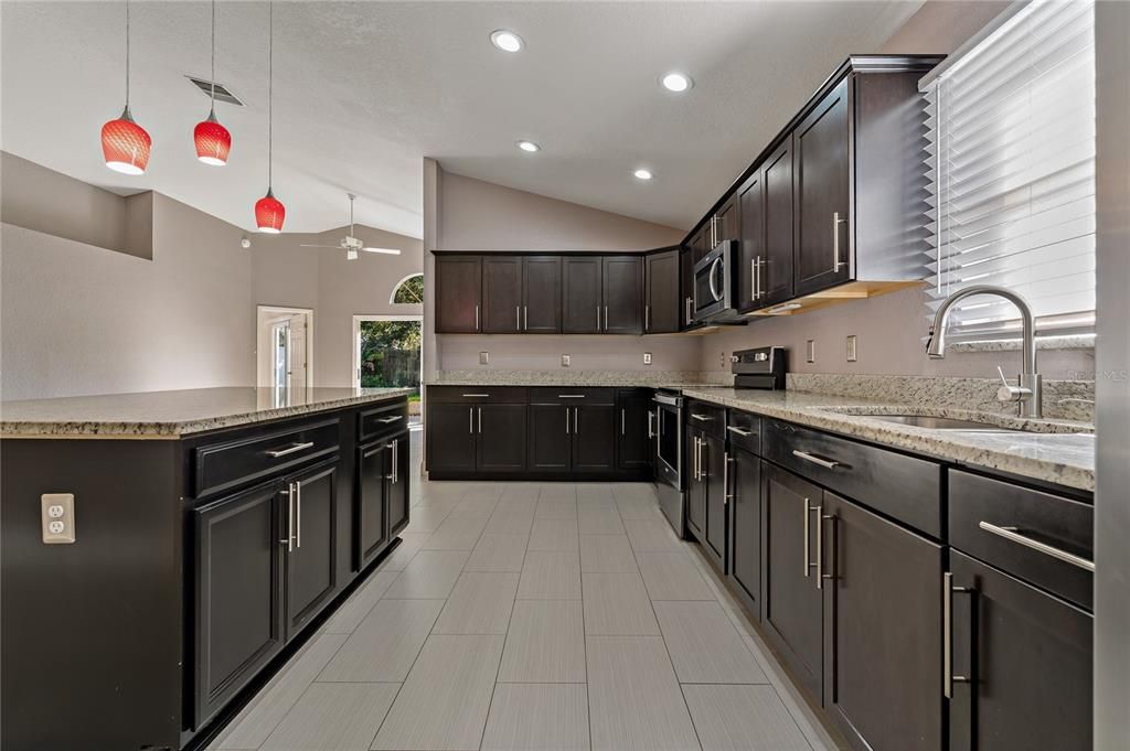 Kitchen - Island includes two electric outlets on either end