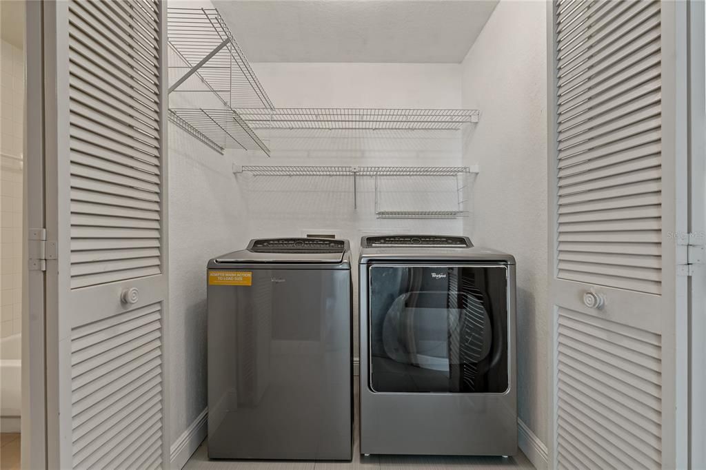 Laundry Room with Shelving - Washer/Dryer Convey