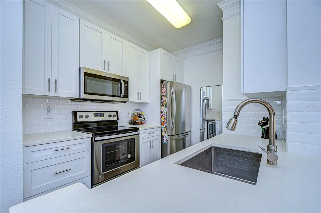 Kitchen view with Stainless-Steel sink