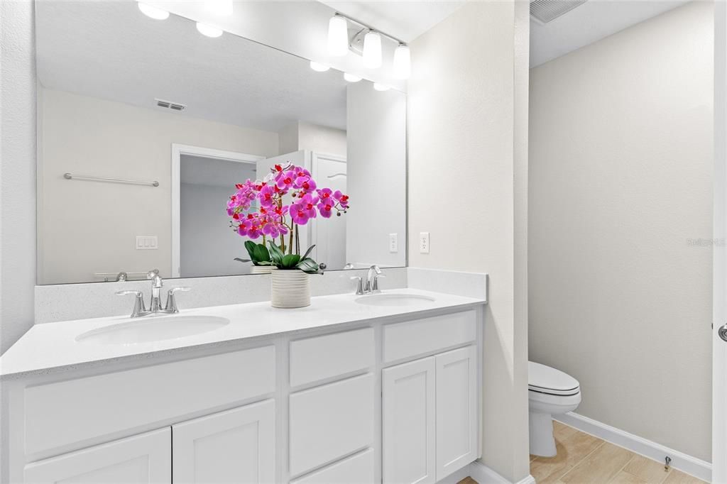 Primary bathroom , double vanity with quartz counters