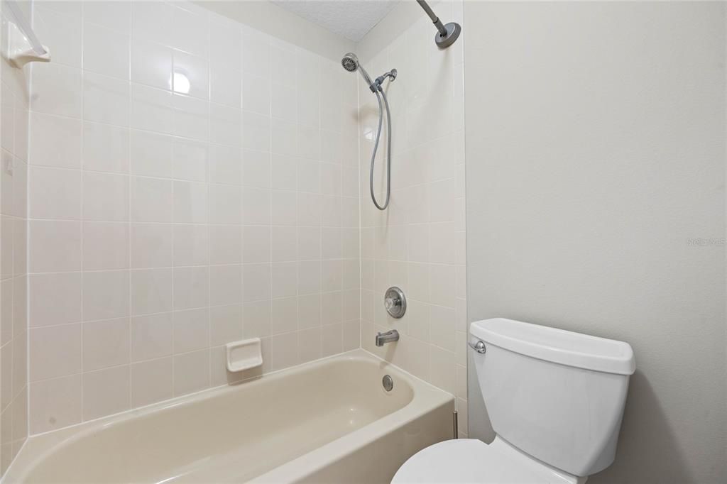 Guest BathroomFeatures dual vanities for added functionality and convenience.Direct access from Bedroom 2 for a private en suite feel.Separate room for the toilet and shower, offering privacy and versatility.