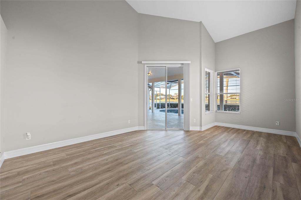 Primary BedroomSpacious retreat with lake views and an abundance of natural light.Custom closet systems for organized storage.En suite bath features timeless design and modern comforts.