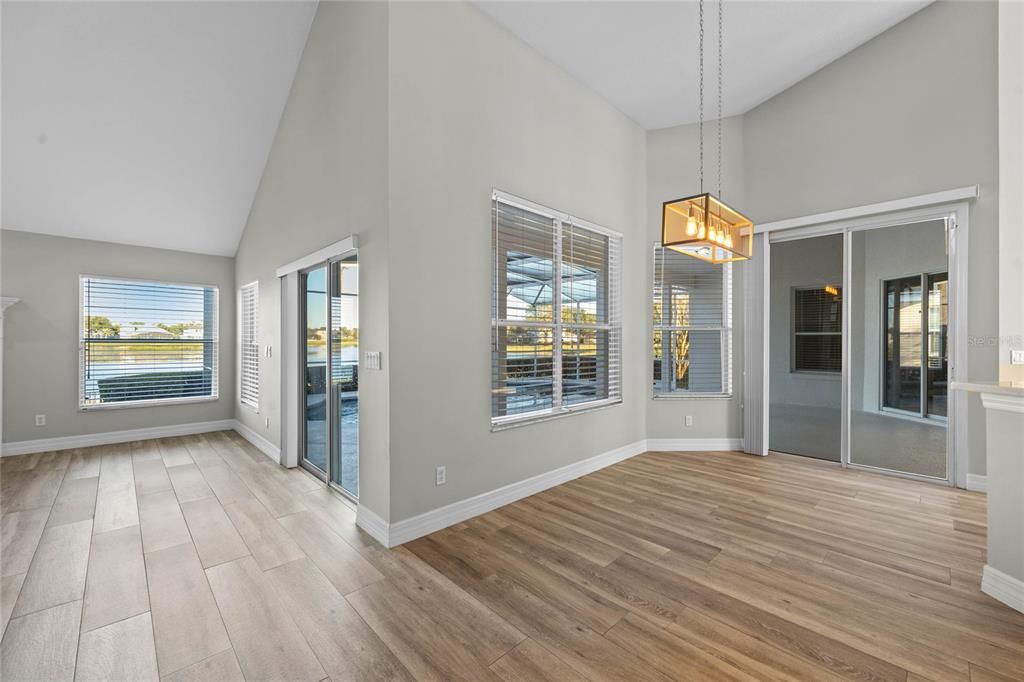 Kitchen & Dinette Renovated kitchen with stone countertops and custom pantry shelving.Newer Whirlpool stainless steel appliances (2020).Breakfast nook offers tranquil lakefront views for your morning coffee.Refinished cabinetry adds a modern yet timeless touch.