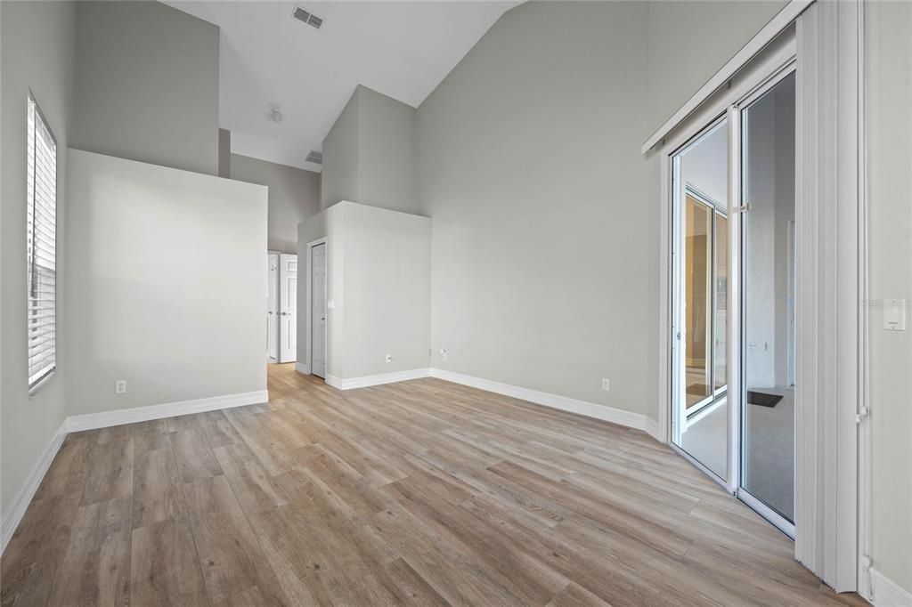 Primary BedroomSpacious retreat with lake views and an abundance of natural light.Custom closet systems for organized storage.En suite bath features timeless design and modern comforts.