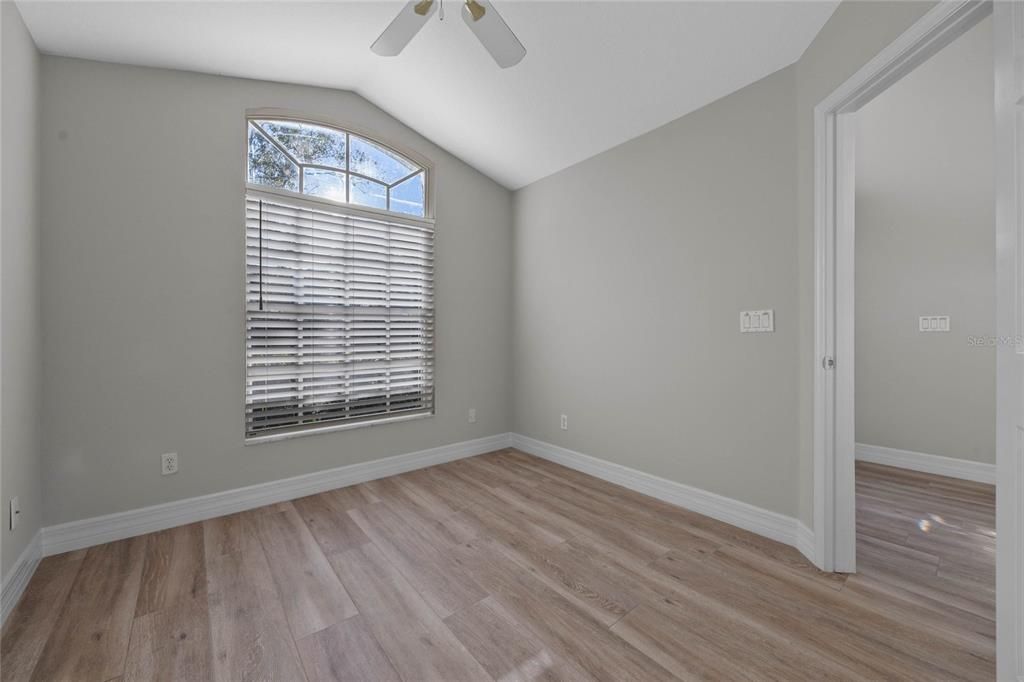 Bedroom 4/OfficeVersatile space perfect as a guest bedroom or home office.Located at the front of the house with scenic tree-lined street views.Features a closet and convenient access to the primary bathroom via a private door.