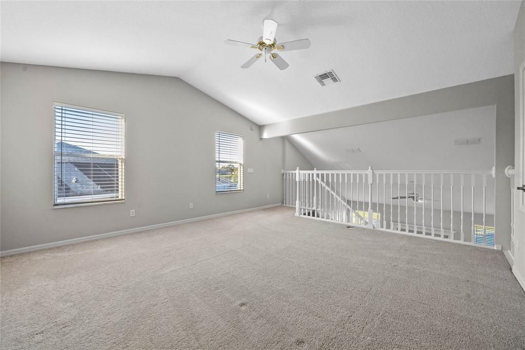 2nd Floor Bonus RoomCarpeted loft with new flooring (2020) offers flexible space for a home office or lounge.Overlooks the main living areas with vaulted ceiling views.