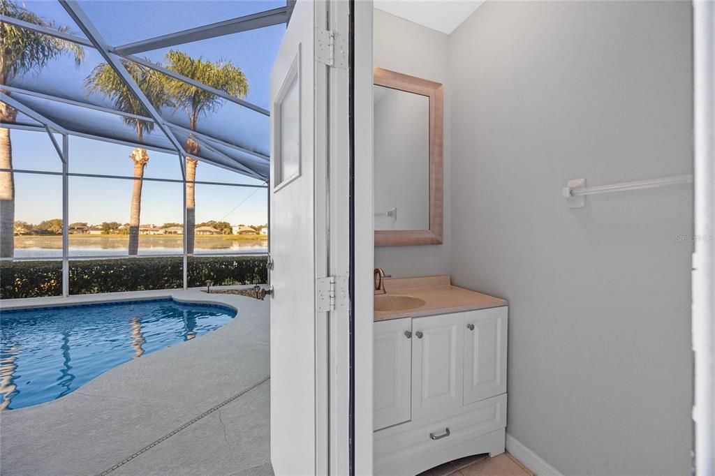 Pool BathConveniently located with exclusive access from the pool deck.Updated half bath with modern finishes, renovated down to the studs in 2020.