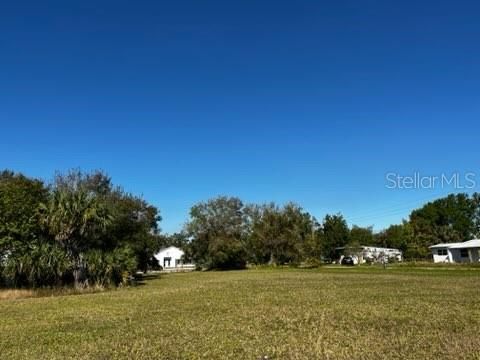 View from Cleveland and US17 intersection toward property back fence on Lander Place.