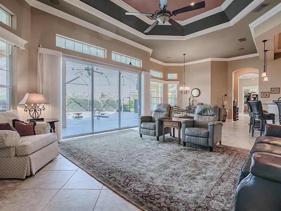 TRAY CEILING WITH CROWN TRIM - CEILING FAN UPGRADES THROUGHOUT THE HOME.