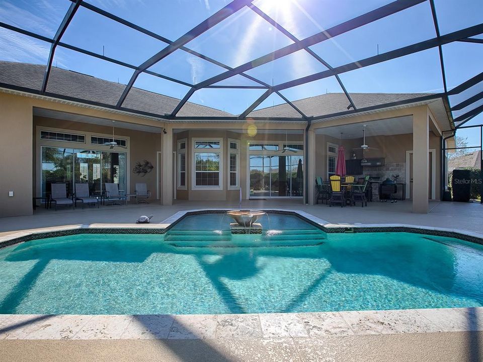 POOL VIEW FROM THE LIVING ROOM, KITCHEN, AND FAMILY ROOM! PRIVATE ENTRANCES TO THE PRIMARY AND 2ND GUEST BEDROOM.