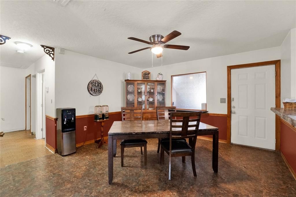 Dining Room - door leads to guest suite/apartment.