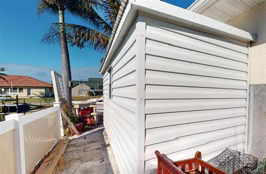 Side of house with Shed for extra storage