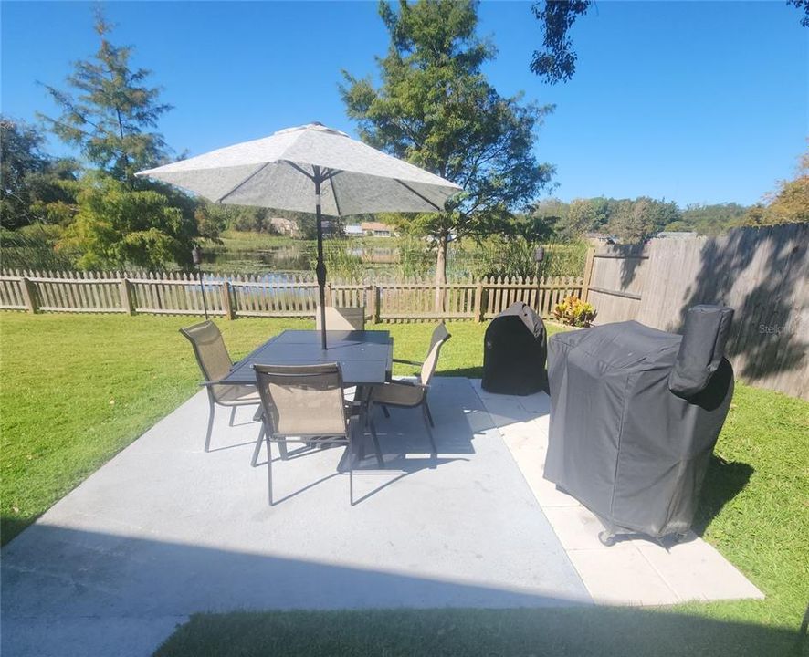 Concrete patio in back yard