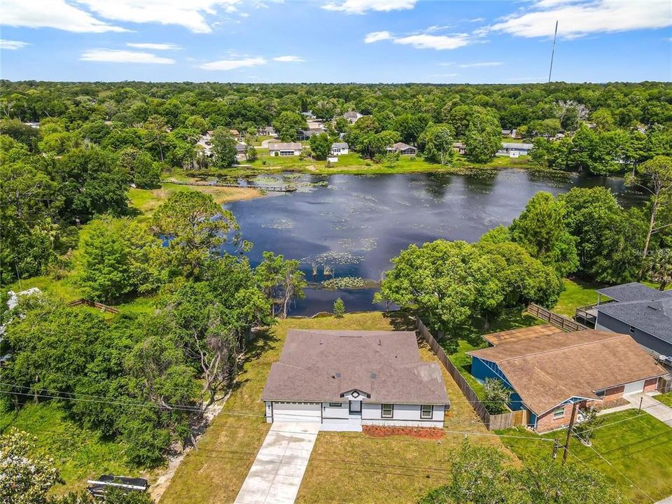 Aerial View of home and private lake