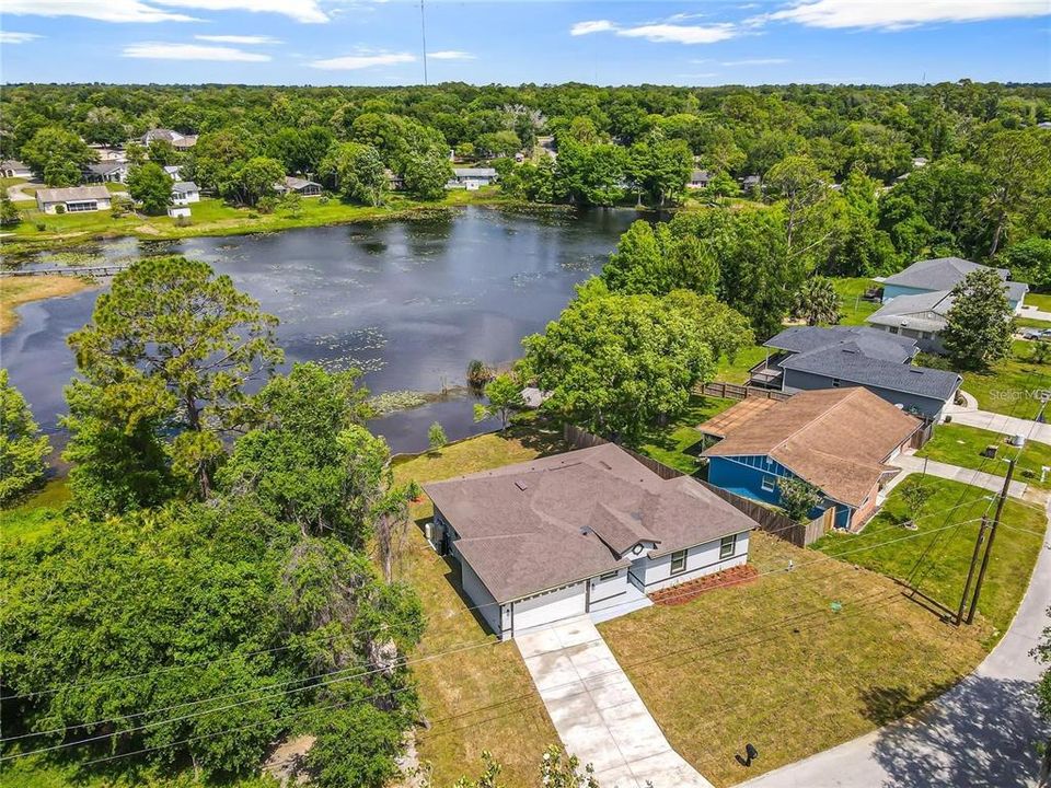 Aerial View of home and private lake