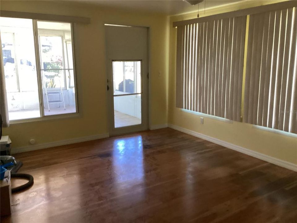 Covered back patio with wall ac unit