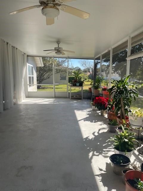 Extended covered porch for plants andmore seating