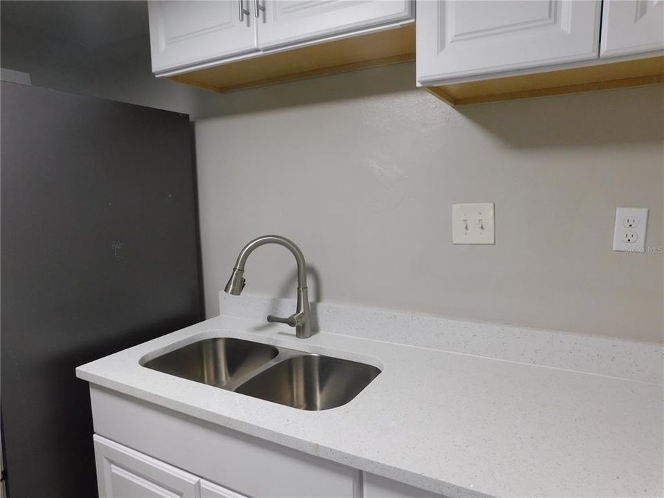 New Quartz counter tops in kitchen