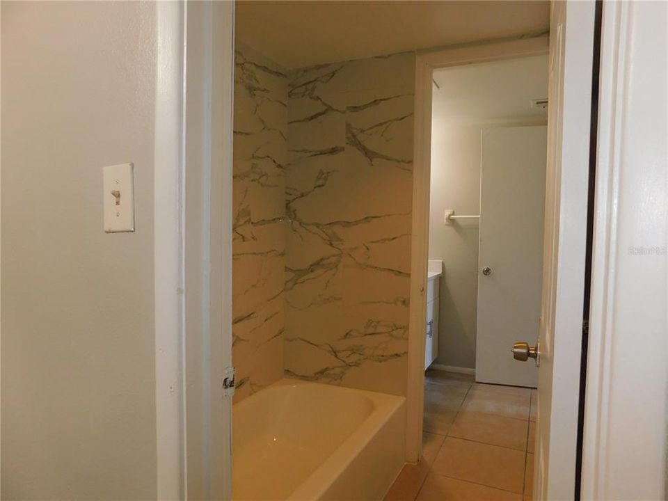 Bathroom redone with new tiles and tub