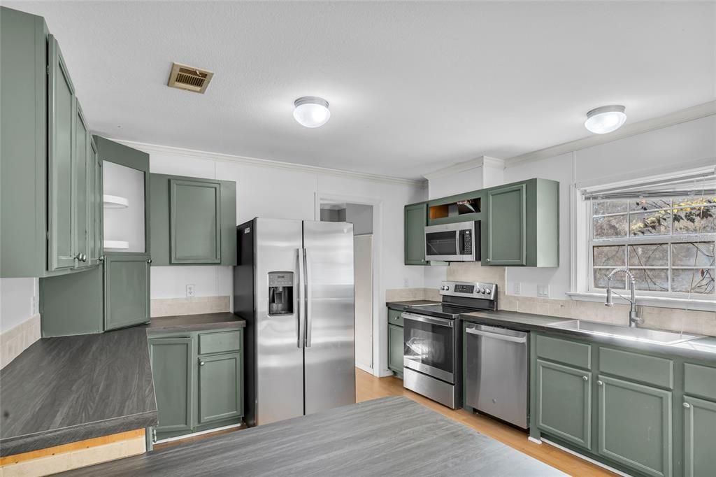 Kitchen with new stainless steel appliances