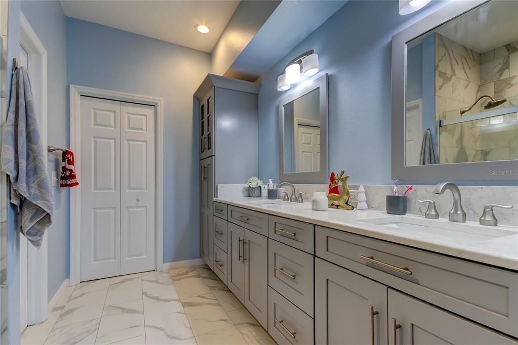 primary bedroom has sliding glass door to patio - tranquil views of the POND and conservation area