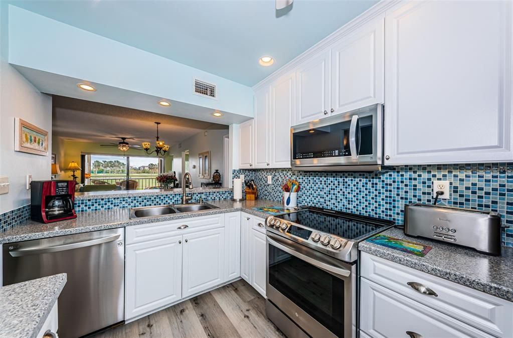 Kitchen has LG Stainless Steel appliances