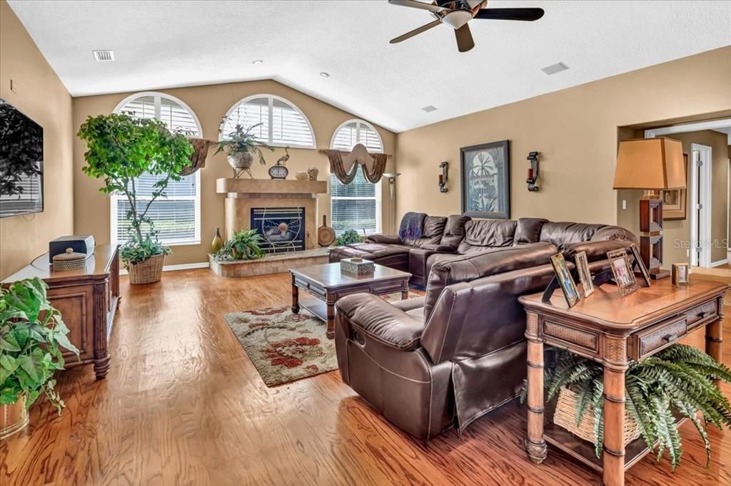 Large family room with wood buring fireplace