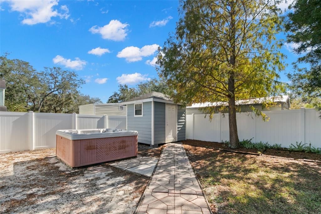 Custom built shed with electric (condition of hot tub unknown)