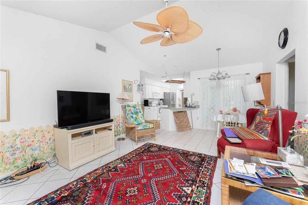 Family room also has a cathedral ceiling and tropical ceiling fan